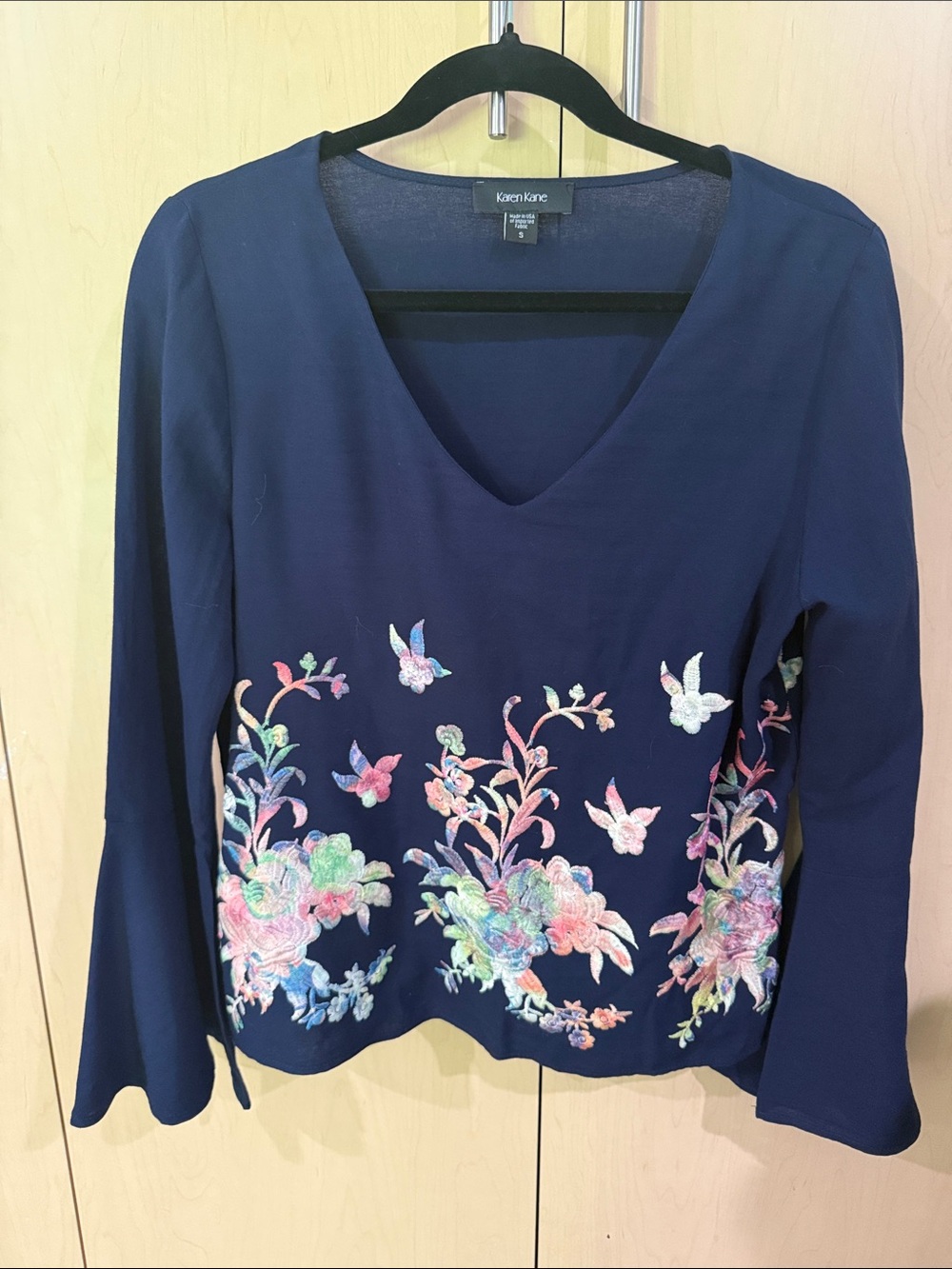 Karen Kane Navy V-Neck Blouse with Pastel Floral Embroidery